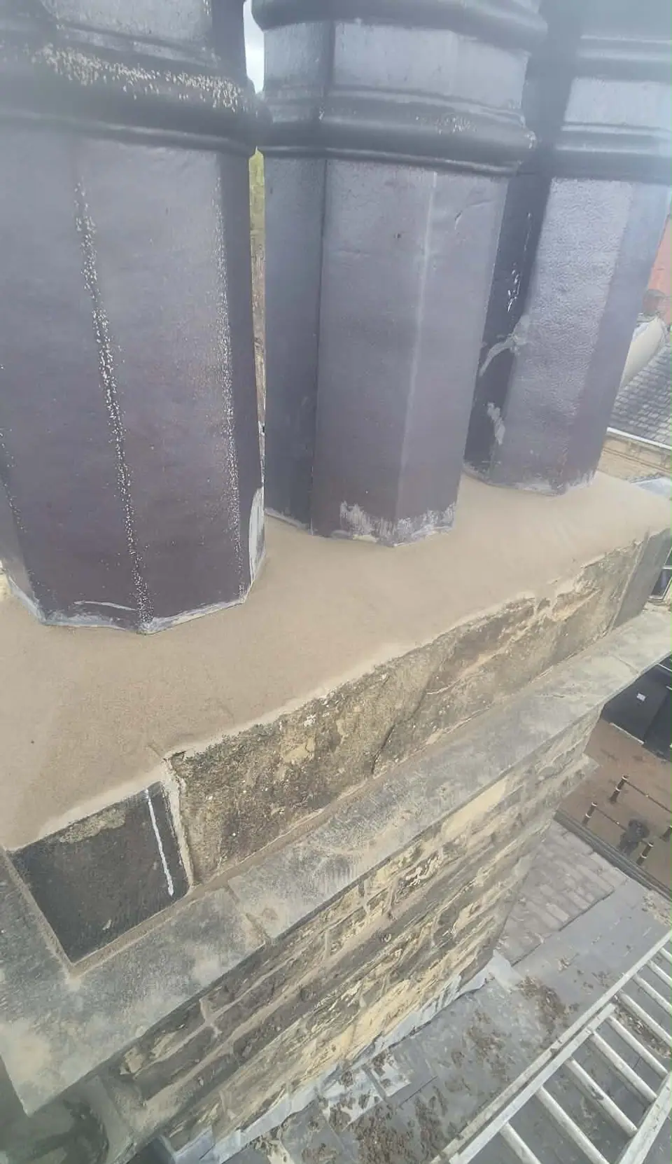 Chimney pots with renewed mortar flaunching