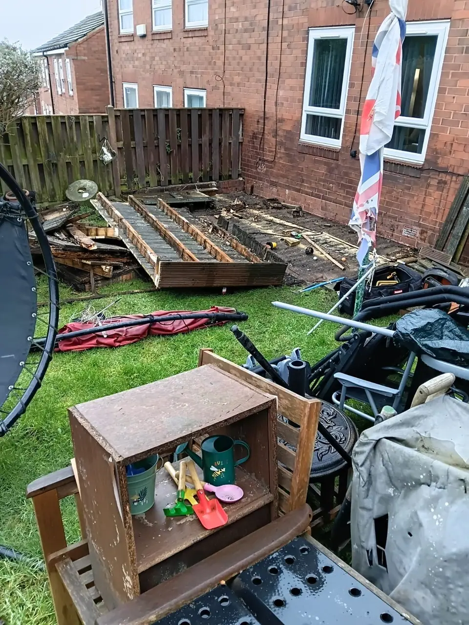 Old garden deck being stripped out before a rebuild