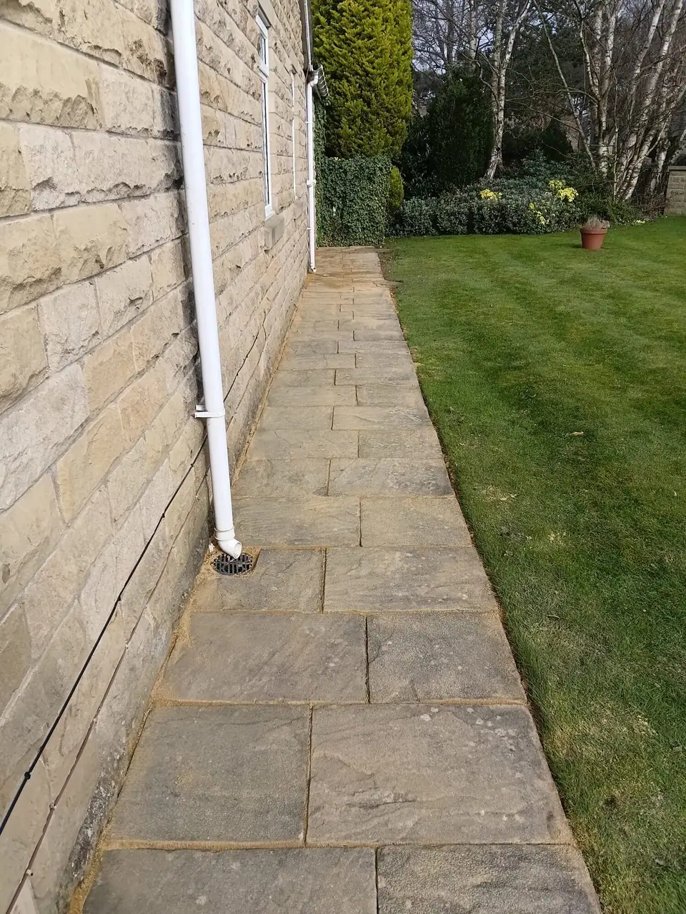The same stone path after the flags were lifted and relaid
